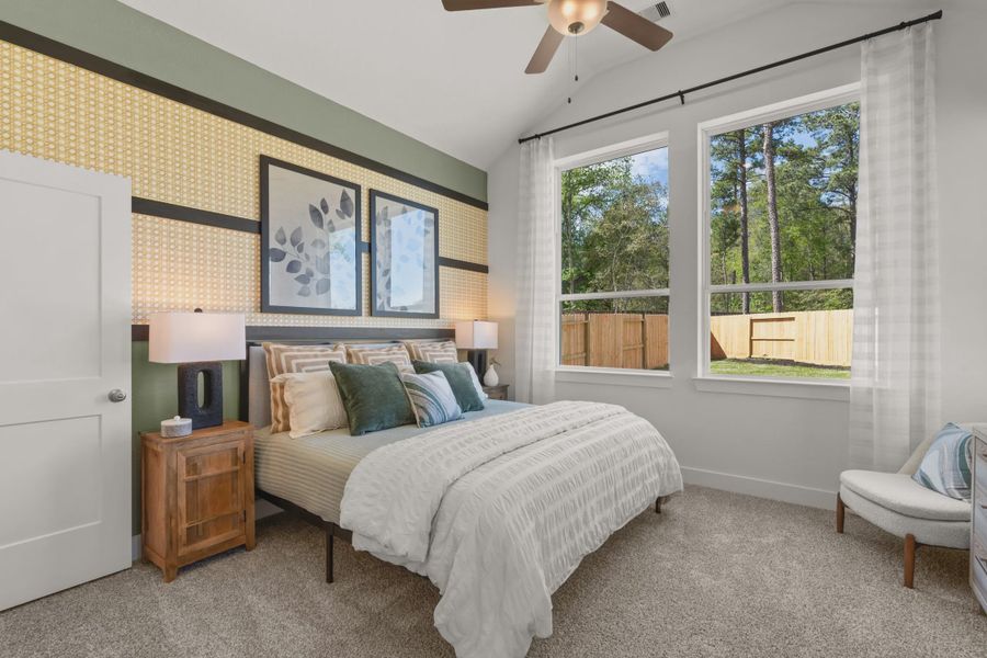 Representative furnished interior of a home built from the Versailles by Chesmar Homes in The Woodland Hills Chateau, Willis (Image 8).