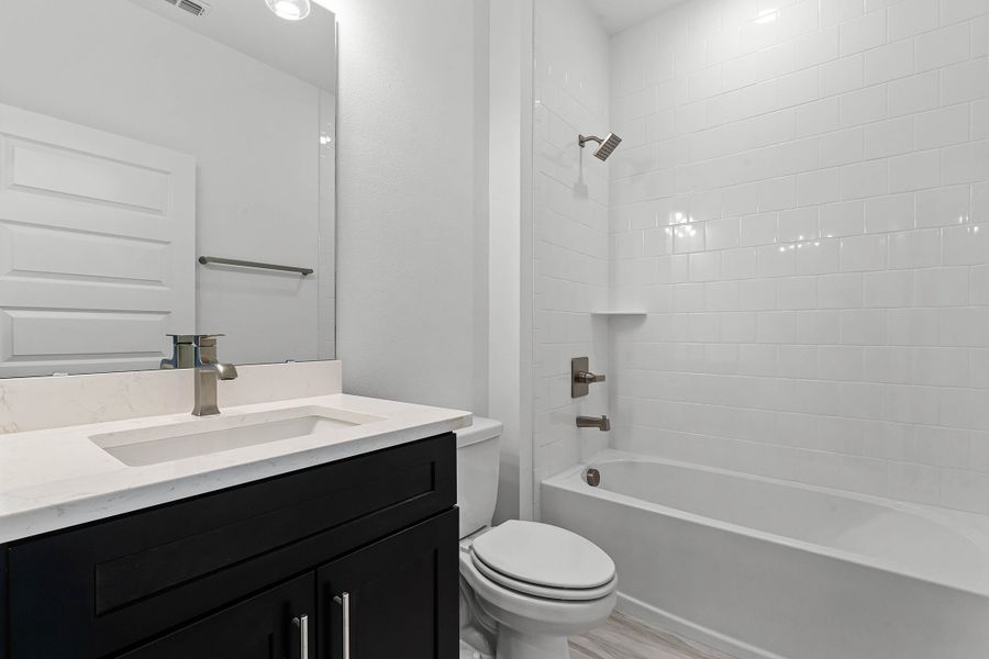 Furnished interior view inside a new home in Harvest at Ovation - Townhomes, Winter Garden (Image 9).