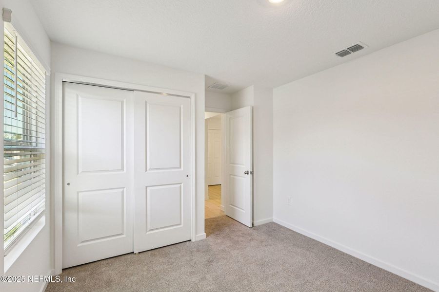 Spacious, unfurnished interior of a new home in Cypress Meadows - Signature Series, Jacksonville (Image 29).