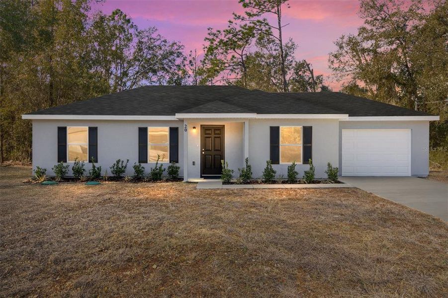 Front exterior of a new home in , Ocala, FL, highlighting curb appeal (Image 18).