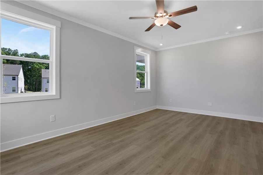 Spacious, unfurnished interior of a new home in The Paddocks at Doc Hughes, Buford (Image 19).