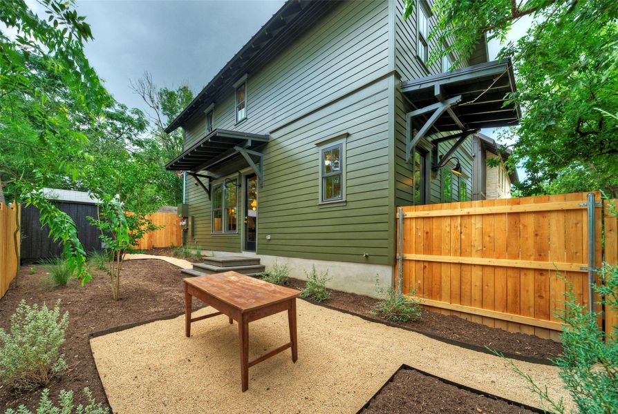 A private backyard oasis with ample space for outdoor entertaining or relaxation.