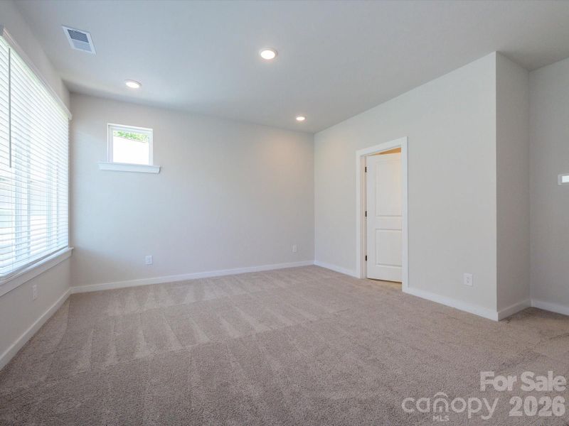 Spacious, unfurnished interior of a new home in Central Living at Craig, Charlotte (Image 25).