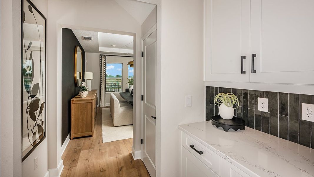 Representative furnished interior of a home built from the Bimini by Taylor Morrison in Ardisia Park, New Smyrna Beach (Image 15).