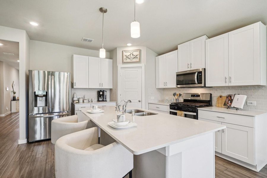 Furnished interior view inside a new home in Sundance Cove - Classic Series, Crosby (Image 14). Furnished interior view inside a new home in Sundance Cove - Classic Series, Crosby (Image 14).