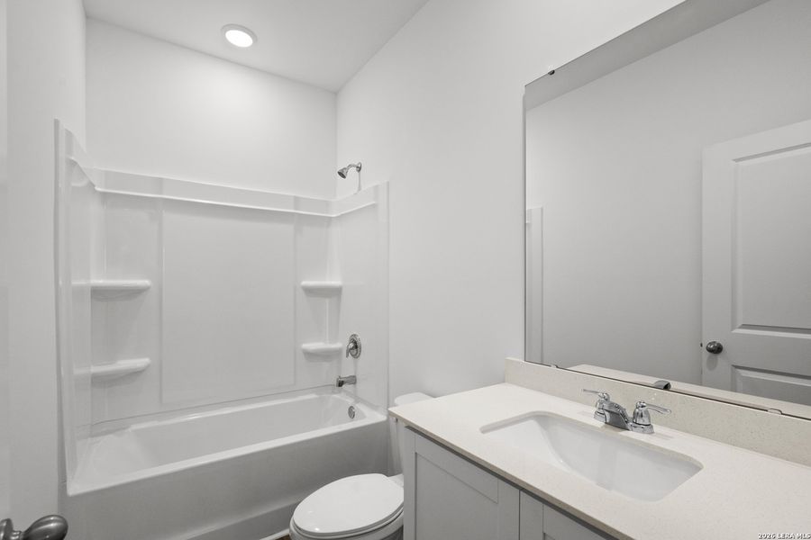 Furnished interior view inside a new home in Sutton Farms, San Antonio (Image 9).