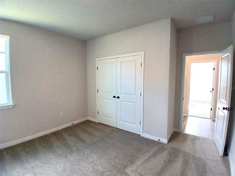 Spacious, unfurnished interior of a new home in Magnolia Series at Seminole Palms, Palm Coast (Image 12).