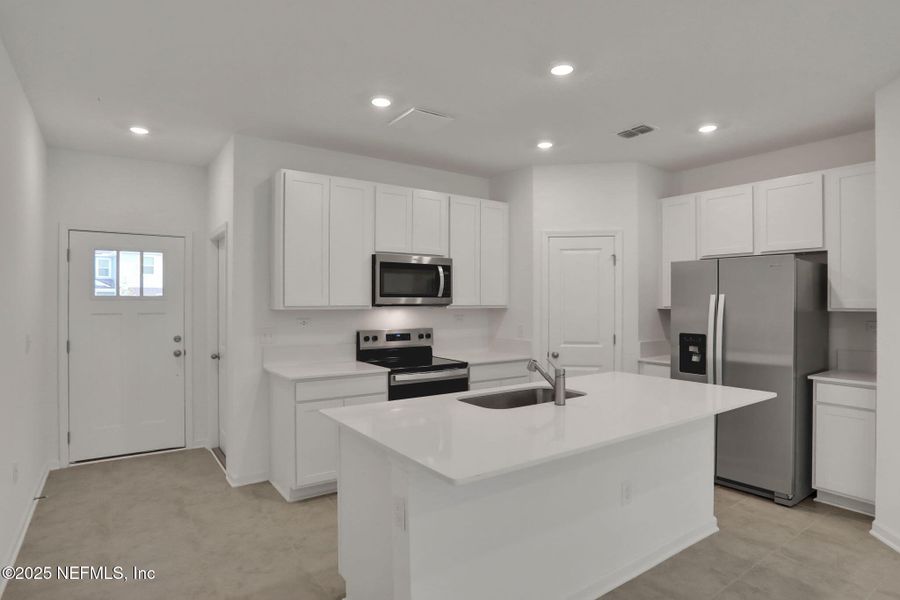 Furnished interior view inside a new home in Atlantis Pointe, Middleburg (Image 3).