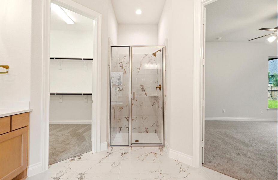 Furnished interior view inside a new home in The Woodlands Hills 65′, Willis (Image 9).