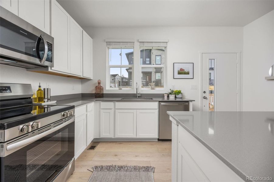 Furnished interior view inside a new home in Whisper Village, Arvada (Image 10).