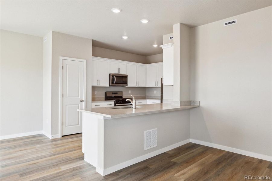 Furnished interior view inside a new home in Second Creek Farm, Bennett (Image 5).