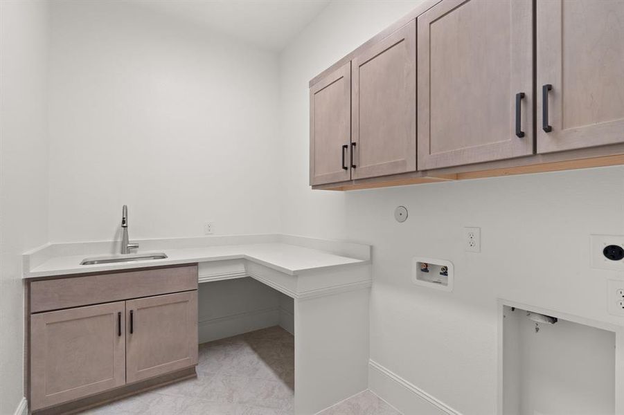 Spacious laundry room with plenty of storage space