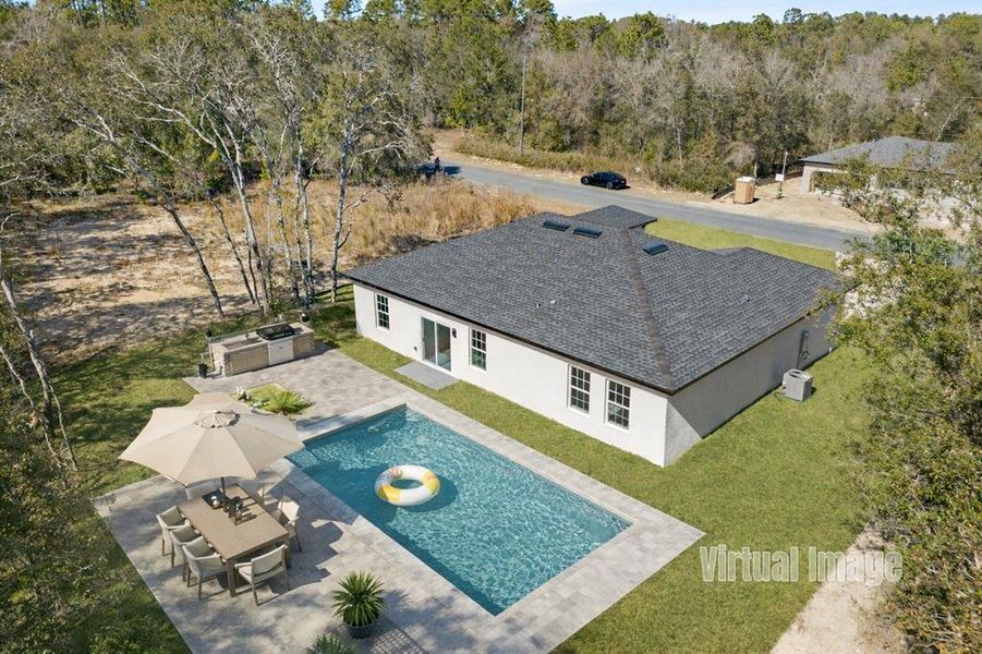 Exterior details and patio area of a home in , Citrus Springs (Image 23).