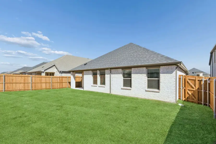 Covered Patio in the Harrison home plan by Trophy Signature Homes – REPRESENTATIVE PHOTO Covered Patio in the Harrison home plan by Trophy Signature Homes – REPRESENTATIVE PHOTO