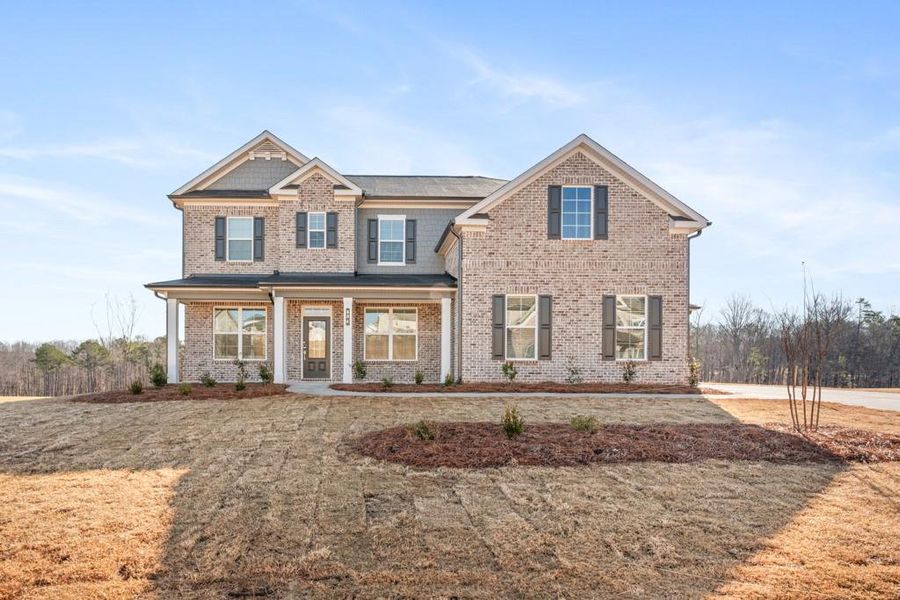 Front exterior of a new home in Oakhurst Manor, McDonough, GA, highlighting curb appeal (Image 18).