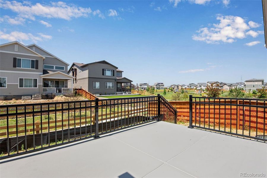 Exterior details and patio area of a home in Reunion Ridge, Commerce City (Image 27).