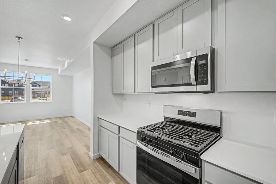 Furnished interior view inside a new home in Arras Park, Thornton (Image 7).