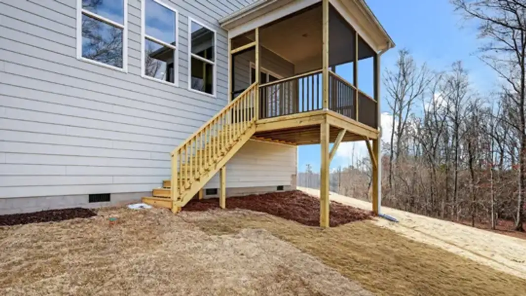 Exterior details and patio area of a home in The Estates Park, Apex (Image 4).