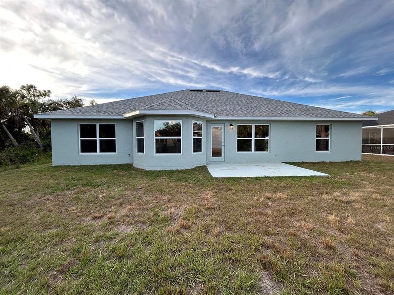 Exterior details and patio area of a home in North Port, North Port (Image 2).
