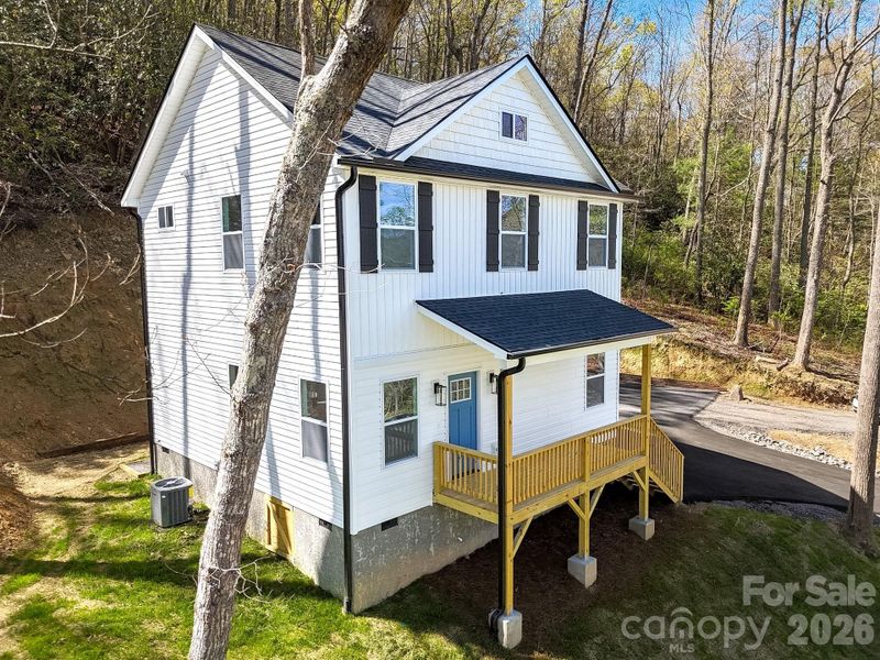 Exterior details and patio area of a home in , Fairview (Image 25).