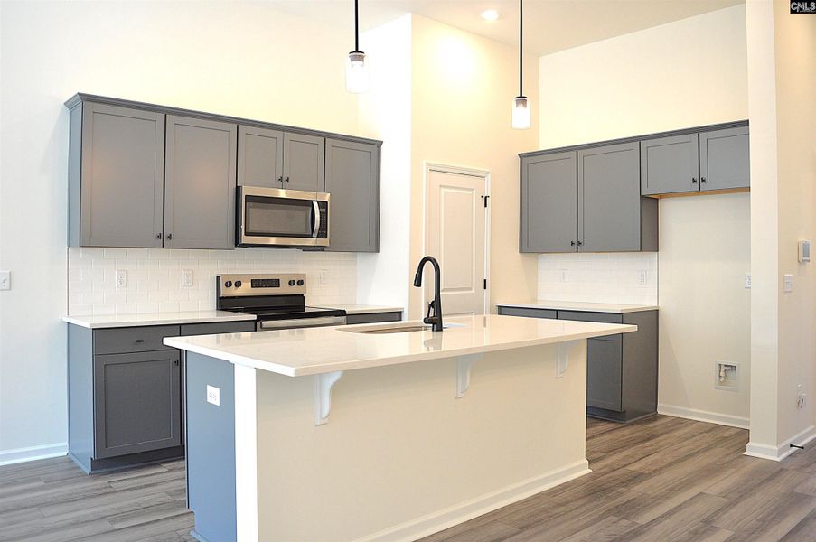 Furnished interior view inside a new home in Piney Woods Bluff, Columbia (Image 3).