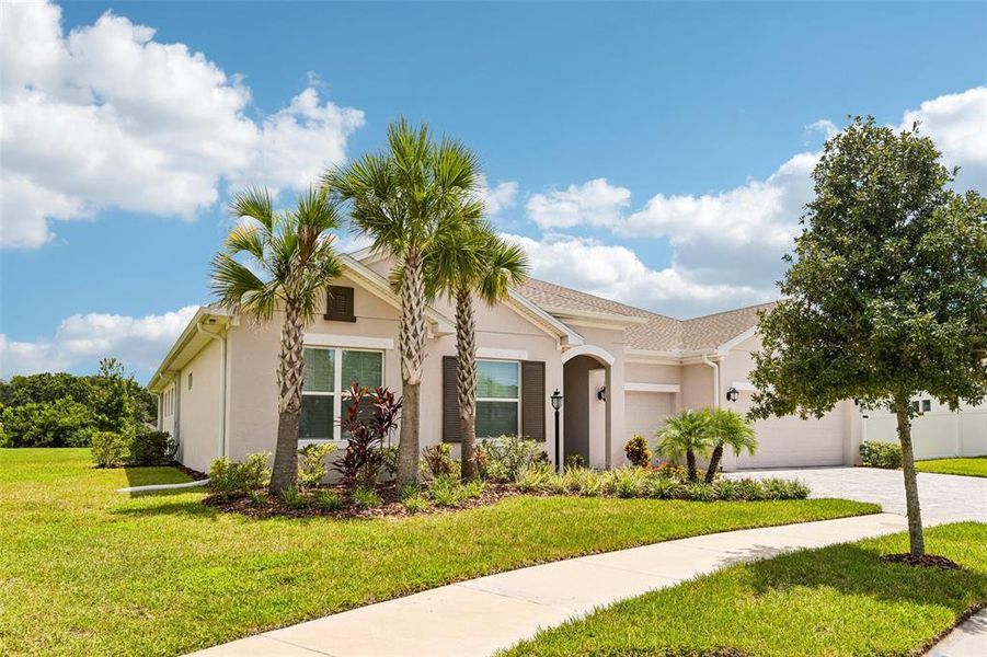 Front exterior of a new home in , Odessa, FL, highlighting curb appeal (Image 23).