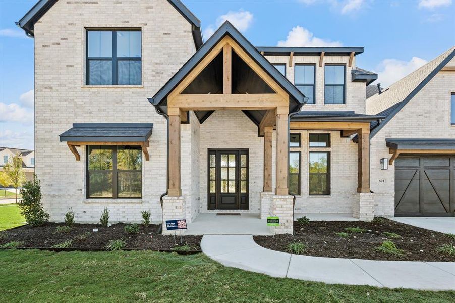 Exterior details and patio area of a home in Parks of Aledo, Aledo (Image 1).