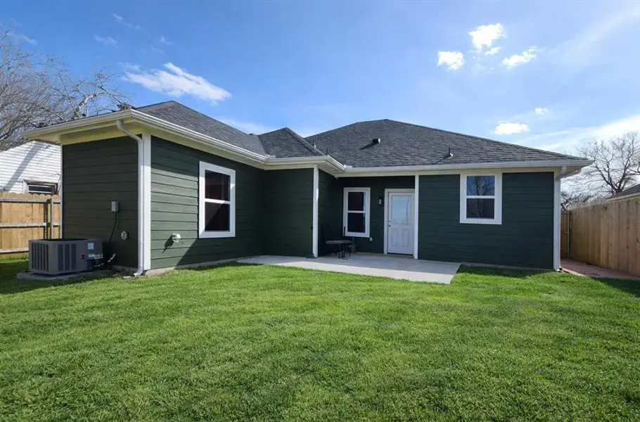 Exterior details and patio area of a home in , Denison (Image 3).