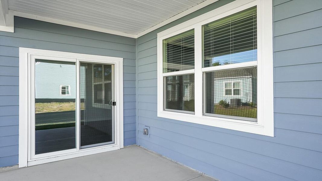 Exterior details and patio area of a home in Hillcrest, Ravenel (Image 3). Exterior details and patio area of a home in Hillcrest, Ravenel (Image 3).