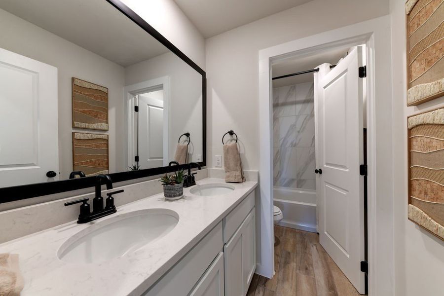 Representative furnished interior of a home built from the Bandera by Hakes Brothers in Hickory Ridge Estates, Elmendorf (Image 11).