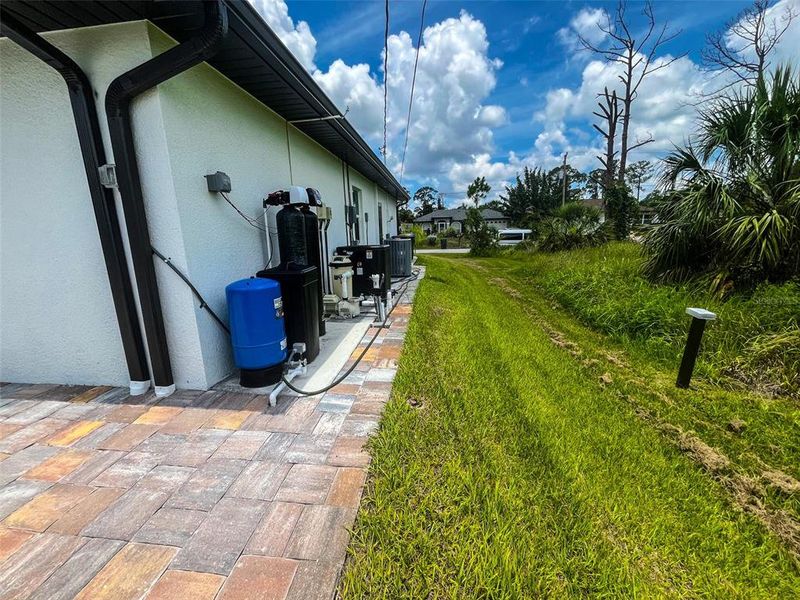 Exterior details and patio area of a home in , North Port (Image 26).