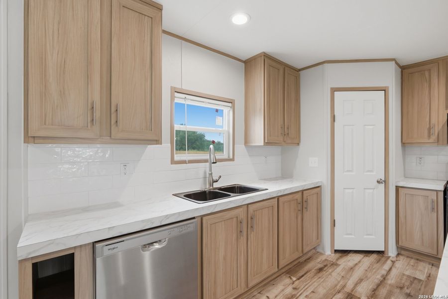 Furnished interior view inside a new home in , Atascosa (Image 3).