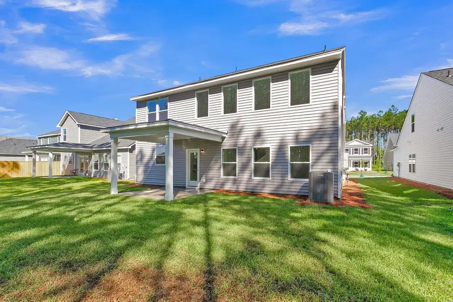 Exterior details and patio area of a home in , Ravenel (Image 2).