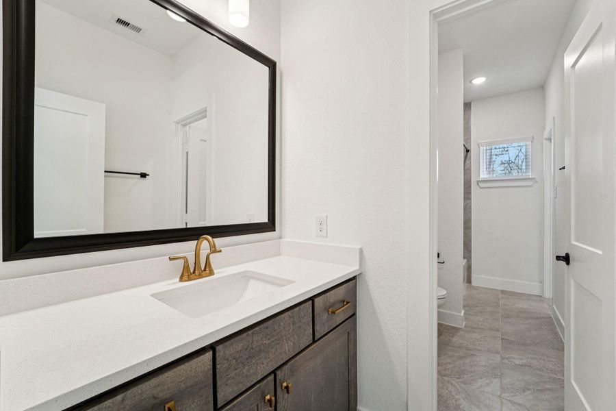 Furnished interior view inside a new home in The Woodlands Hills, Willis (Image 9).