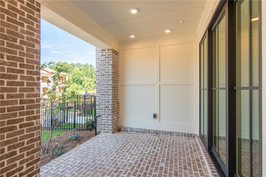 Exterior details and patio area of a home in IveyBrooke, Alpharetta (Image 16). Exterior details and patio area of a home in IveyBrooke, Alpharetta (Image 16).