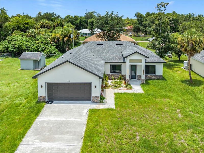 Front exterior of a new home in , Port Charlotte, FL, highlighting curb appeal (Image 29). Front exterior of a new home in , Port Charlotte, FL, highlighting curb appeal (Image 29).