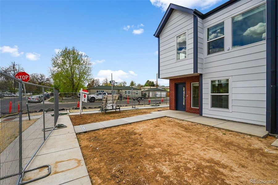 Front exterior of a new home in , Aurora, CO, highlighting curb appeal (Image 26).