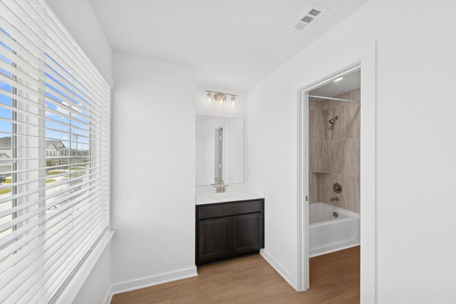 Furnished interior view inside a new home in Marvida, Cypress (Image 6).
