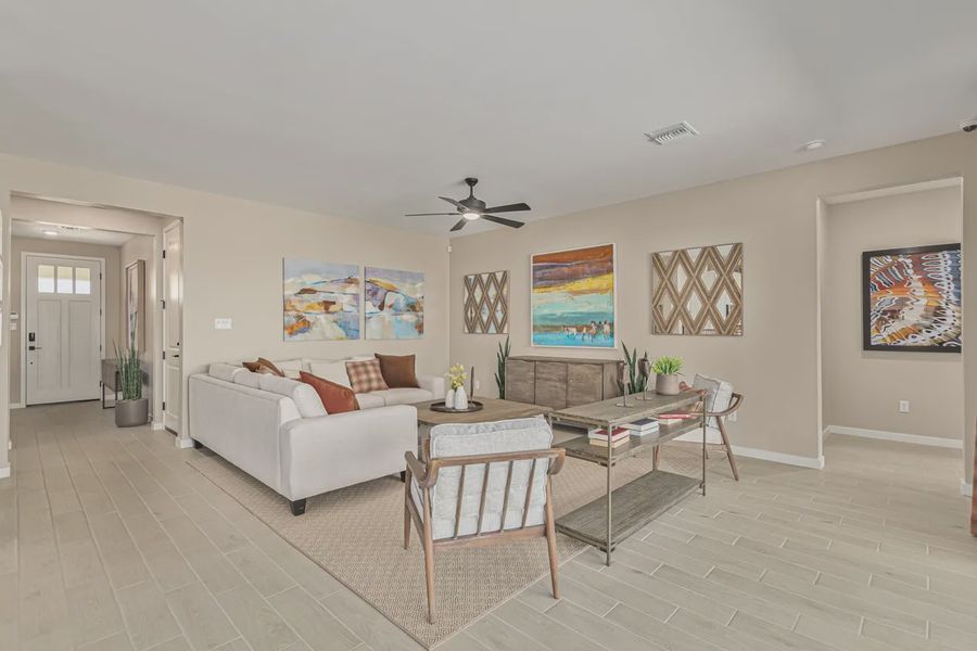 Representative furnished interior of a home built from the 2257 by Elliott Homes in Acacia at Santana, Yuma (Image 10).