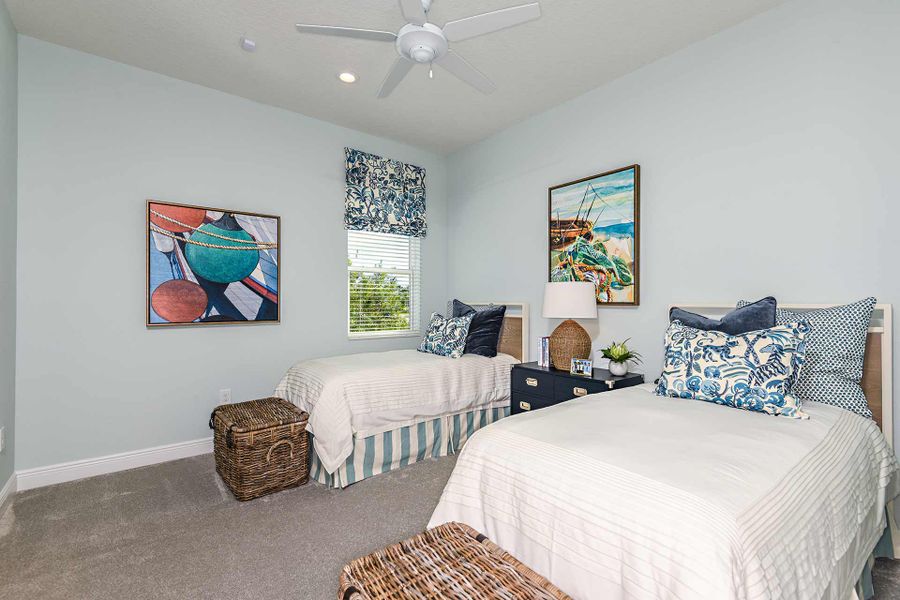 Representative furnished interior of a home built from the Kiawah 2 by Neal Communities in SkySail, Naples (Image 8).