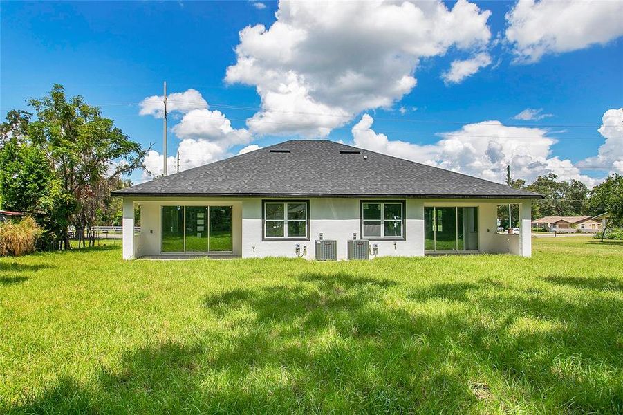 Front exterior of a new home in , Apopka, FL, highlighting curb appeal (Image 36).