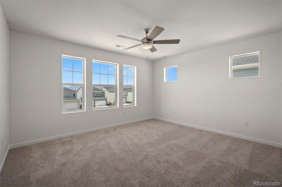Spacious, unfurnished interior of a new home in Revel Crossing at Wolf Ranch – The Ascent Collection, Colorado Springs (Image 25).