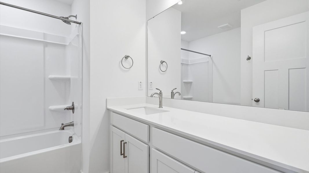 Stylish guest bathroom with superior design and thoughtful storage solutions in Fountain Inn, SC Stylish guest bathroom with superior design and thoughtful storage solutions in Fountain Inn, SC
