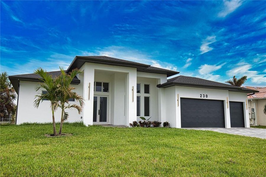 Front exterior of a new home in , Rotonda West, FL, highlighting curb appeal (Image 20). Front exterior of a new home in , Rotonda West, FL, highlighting curb appeal (Image 20).