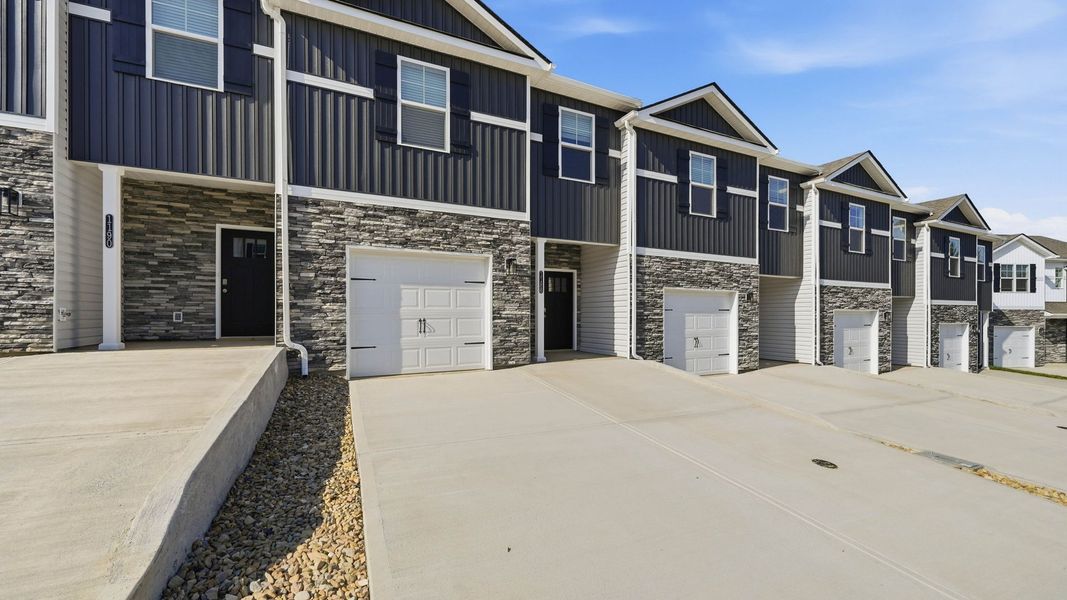 Front exterior of a new home in The Arbor Townhomes, Kingsport, TN, highlighting curb appeal (Image 16).