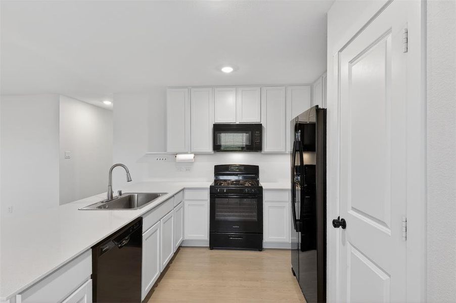 Furnished interior view inside a new home in Creekview, Pilot Point (Image 9).