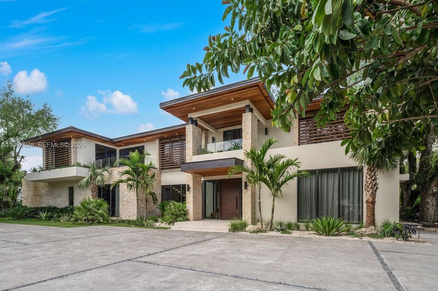 Front exterior of a new home in , Miami, FL, highlighting curb appeal (Image 23).
