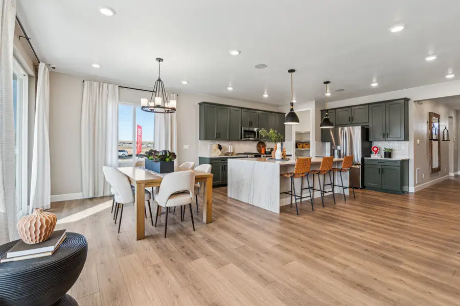 Furnished interior view inside a new home in Trailstone, Arvada (Image 27).