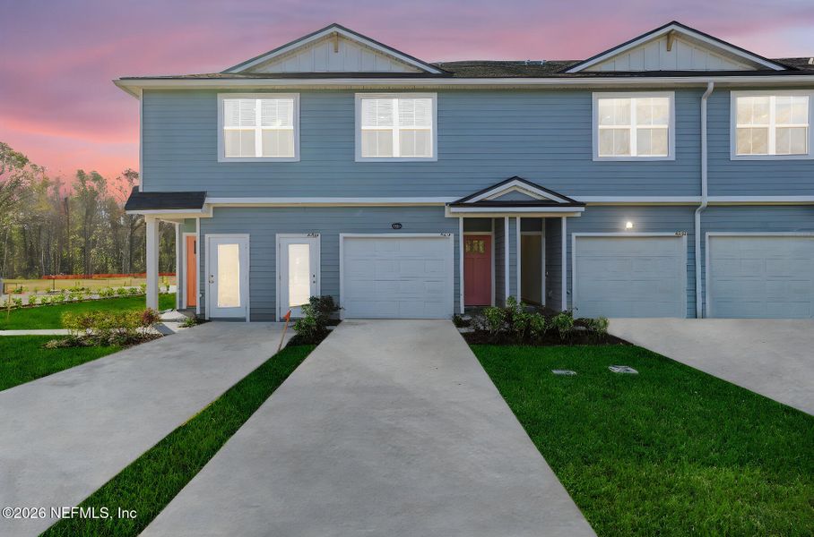 Front exterior of a new home in , Jacksonville, FL, highlighting curb appeal (Image 26).