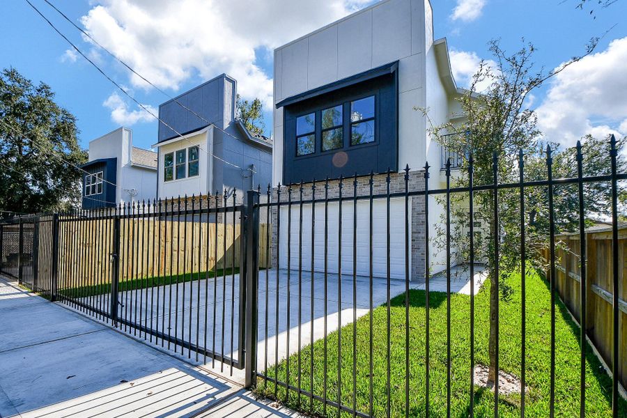 Front exterior of a new home in , Houston, TX, highlighting curb appeal (Image 26). Front exterior of a new home in , Houston, TX, highlighting curb appeal (Image 26).